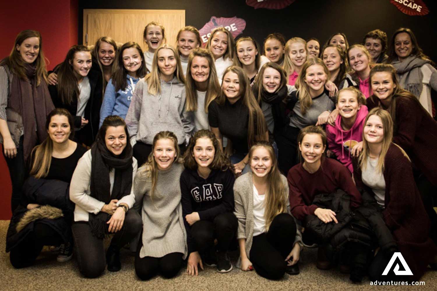 big group after solving big puzzles in an escape room in reykjavik