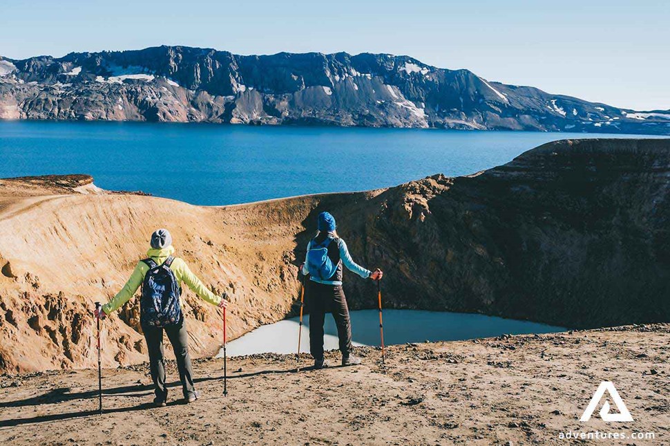 two people trekking Askja near Viti crater lake