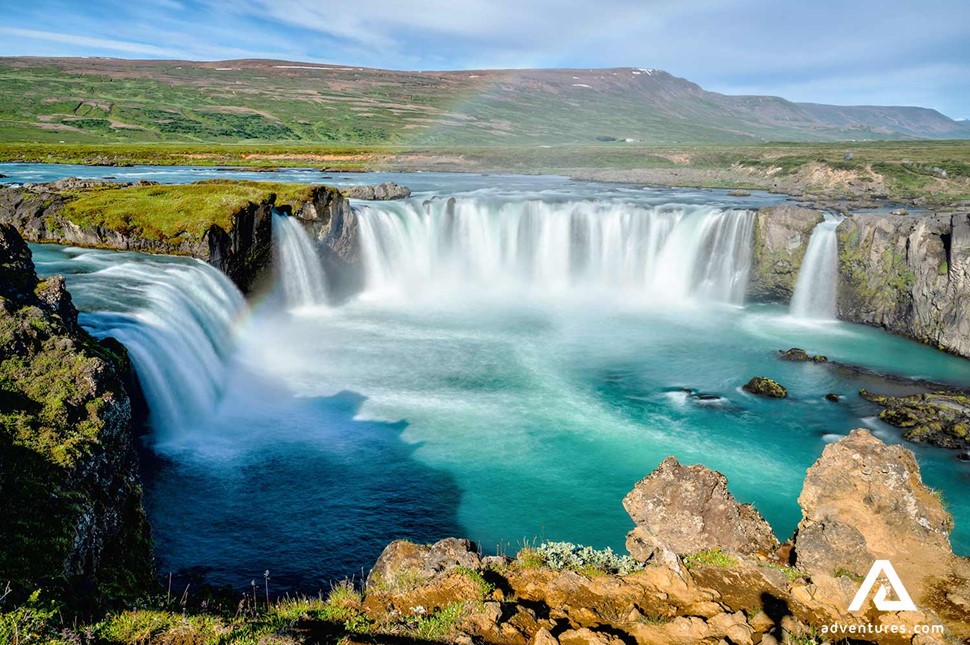 godafoss waterfall in summer on a sunny day