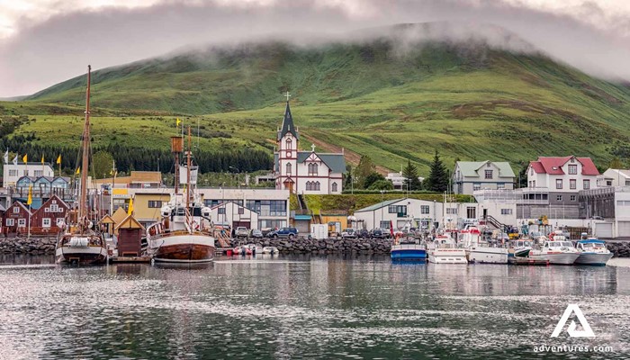 husavik town harbor view with boats