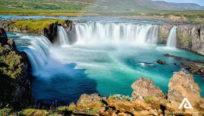 sunny view of godafoss waterfall in summer