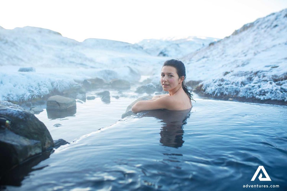 woman in a hot spring in winter in highlands