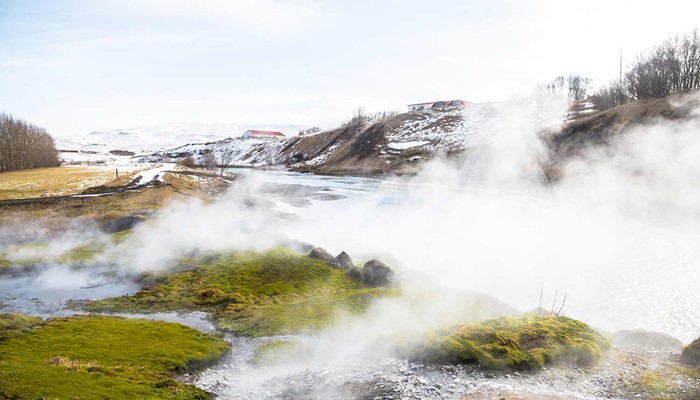 steaming hot springs in secret lagoon near fludir