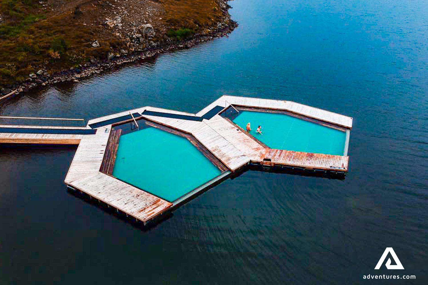 vok baths in a lake near egilsstadir