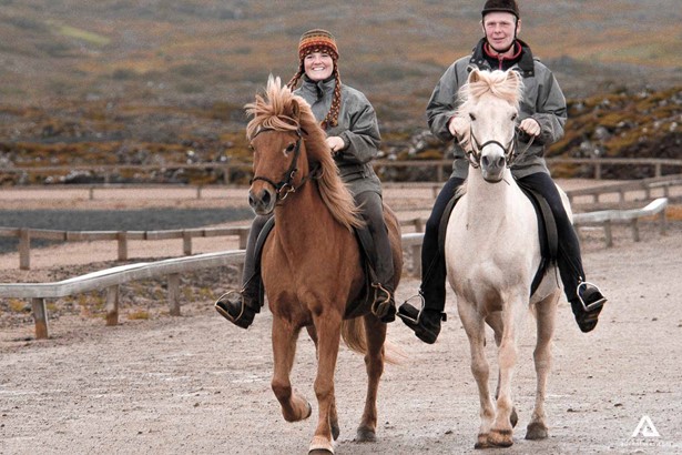 Couple riding horses