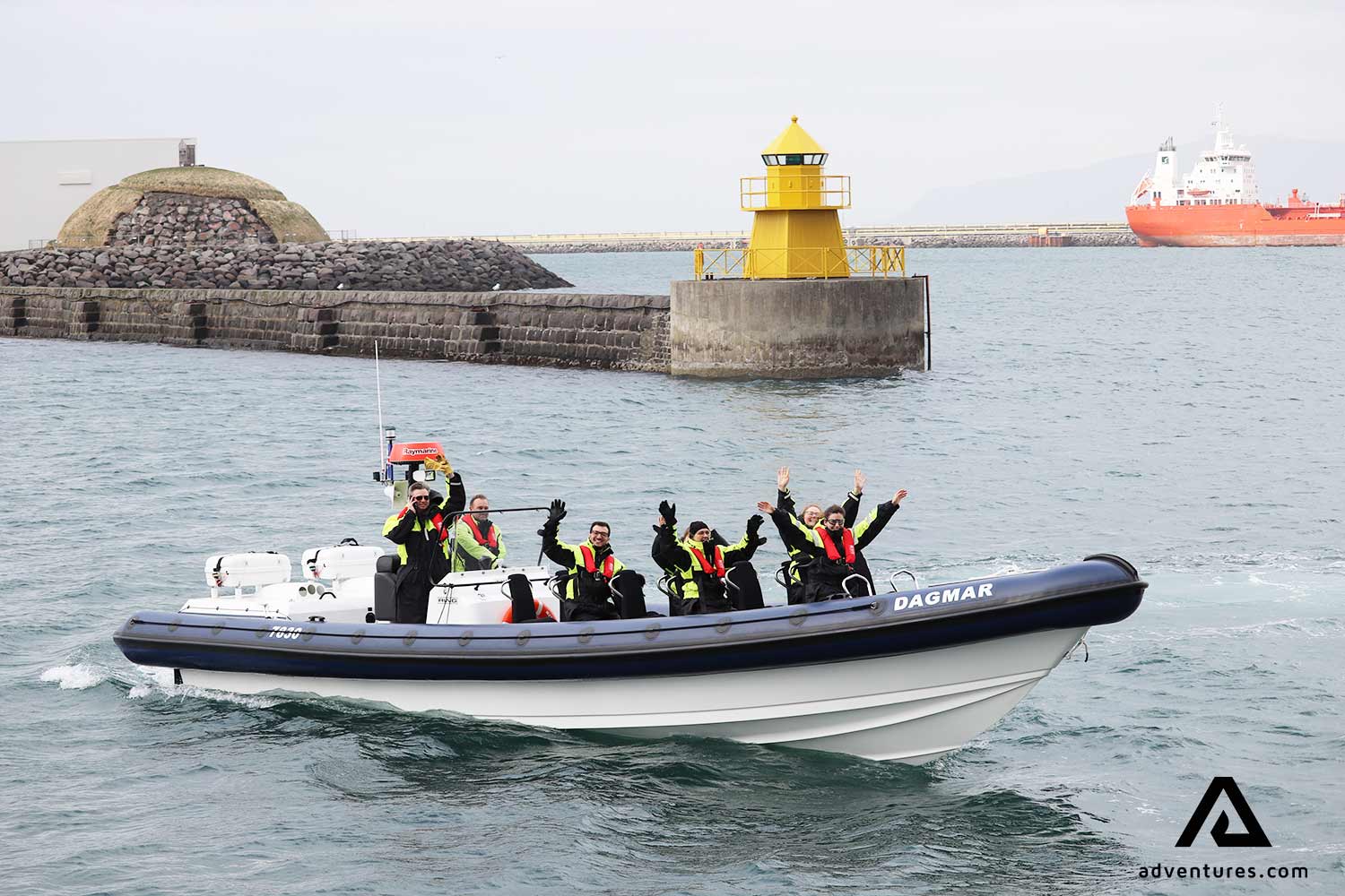 Happy group waving hands on a tour