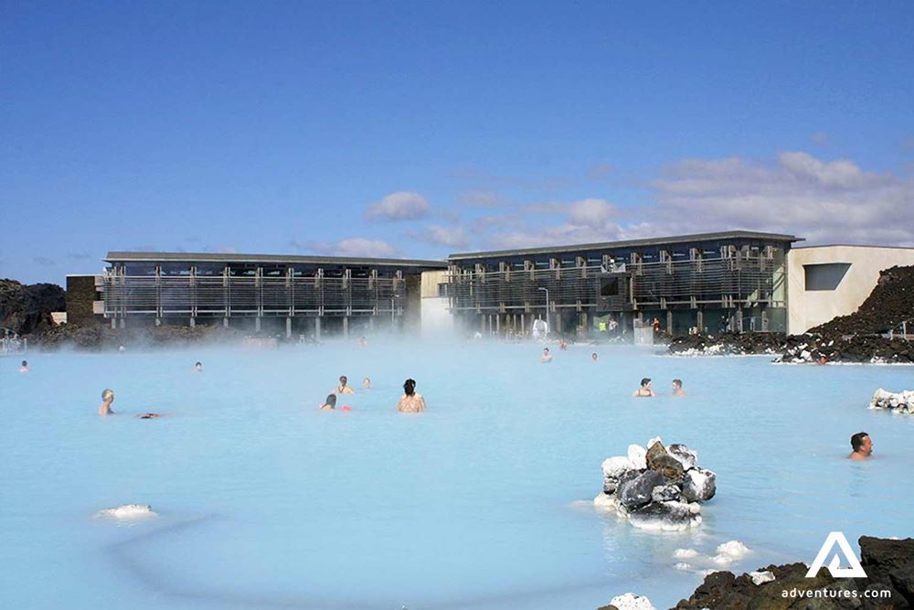 people enjoying bathing in a geothermal blue lagoon