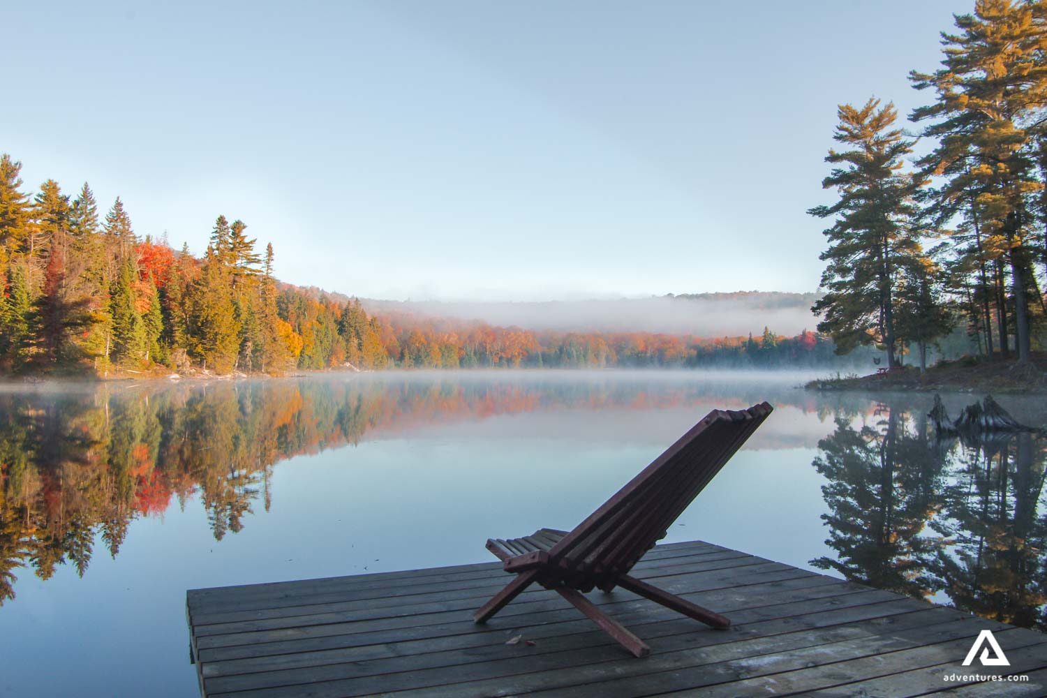 Chair on the shore of a lake