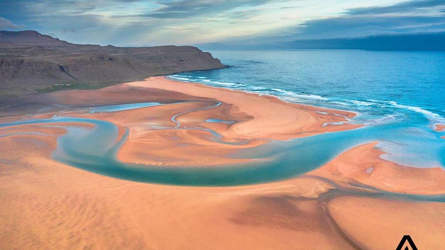 red sand beach in westfjords