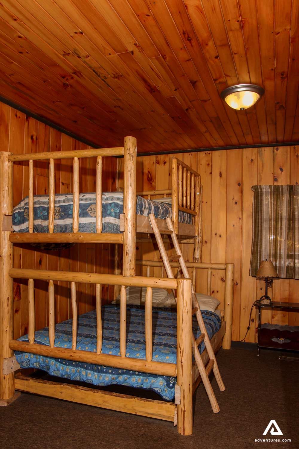 Double floor wooden bed in the lodge