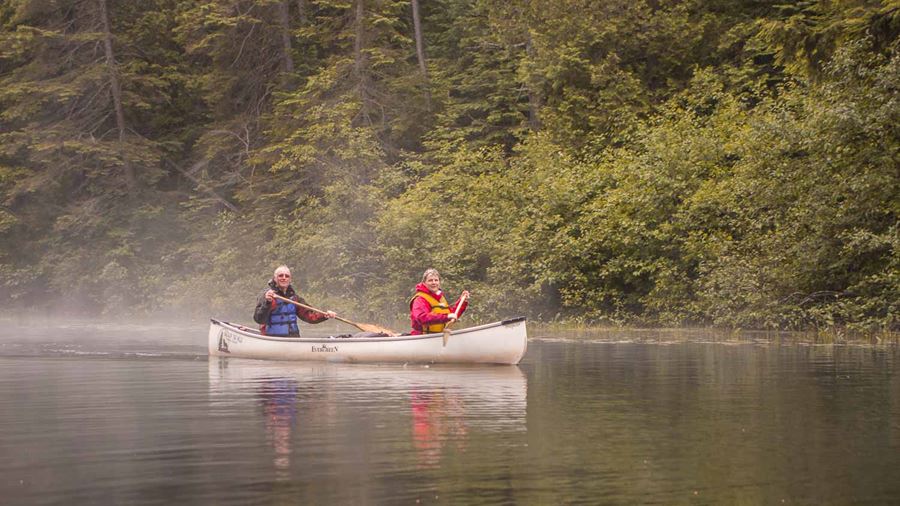 Couple canoeing in Canada
