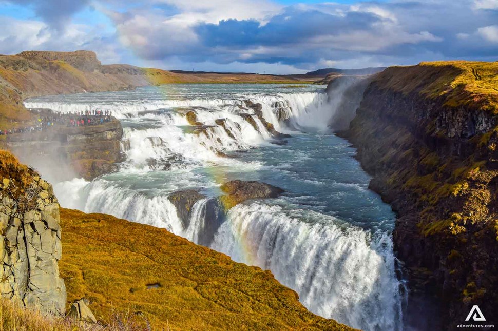 gullfoss waterfall in iceland with a rainbow