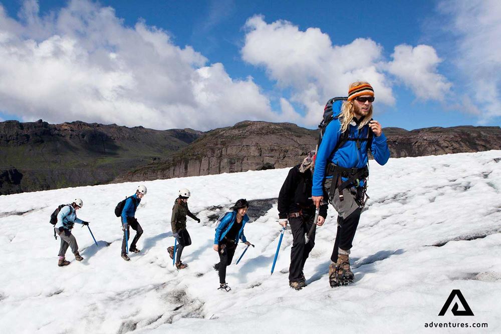 small group hiking on solheimajokull