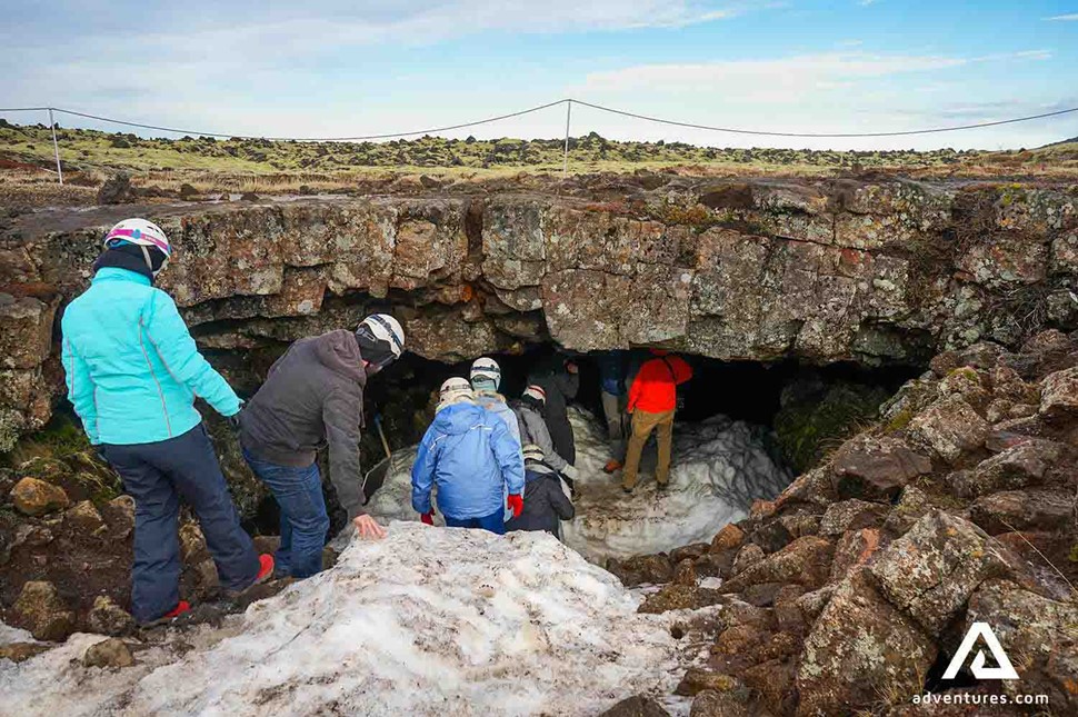 people entering leidarendi cave in reykjanes