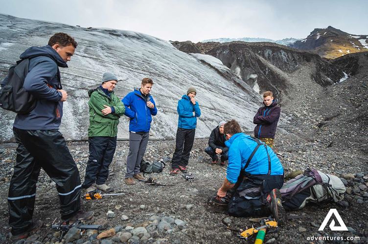 preparing for a glacier tour preparing for a glacier tour on solheimajokull