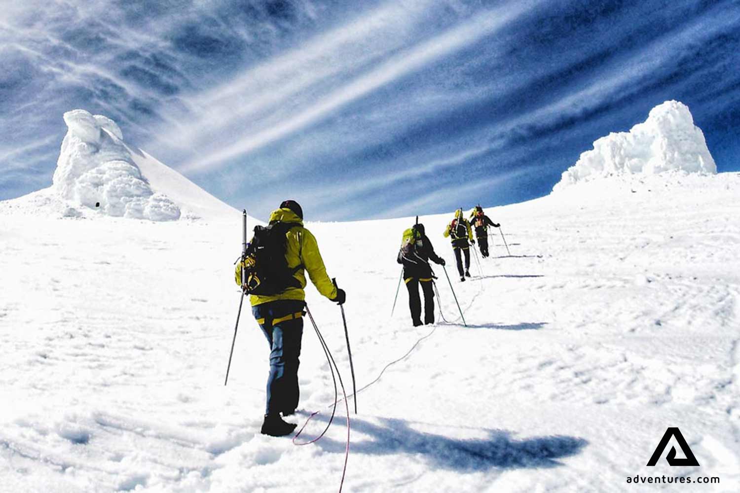 people hiking to the top of snaefellsjokull glacier mountain