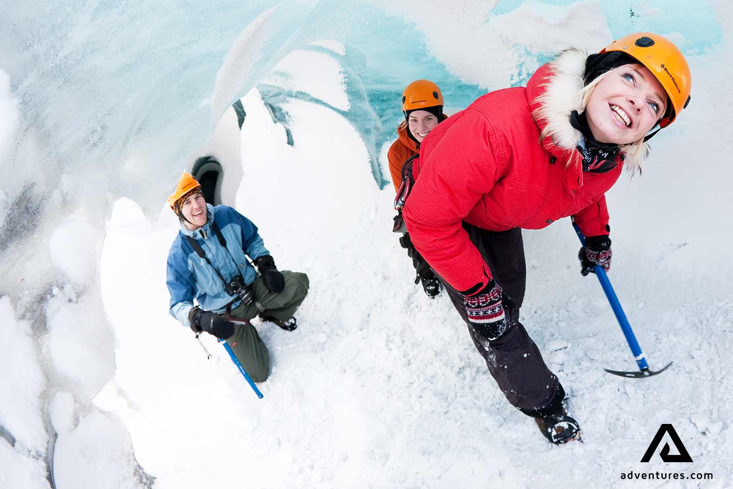 small group exploring ice caves