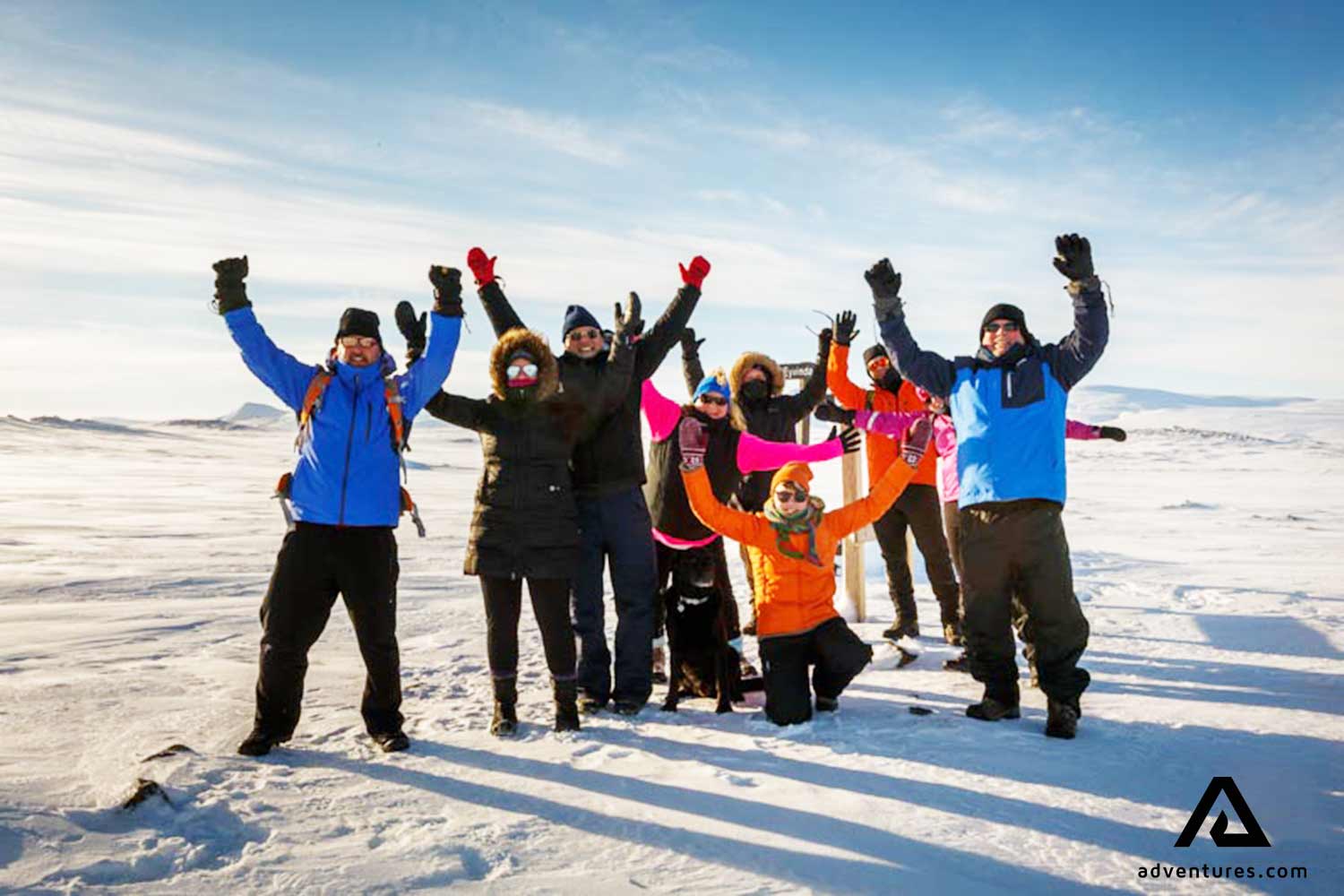 happy group in hveravellir area in winter