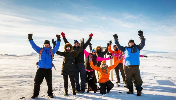 happy group in hveravellir area in winter