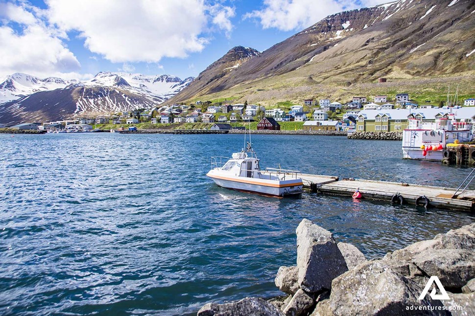 small fishing boat in siglufjordur harbor