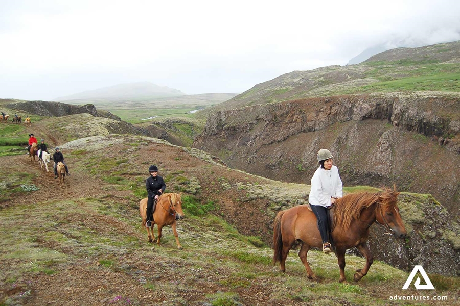 riding horses near a canyon