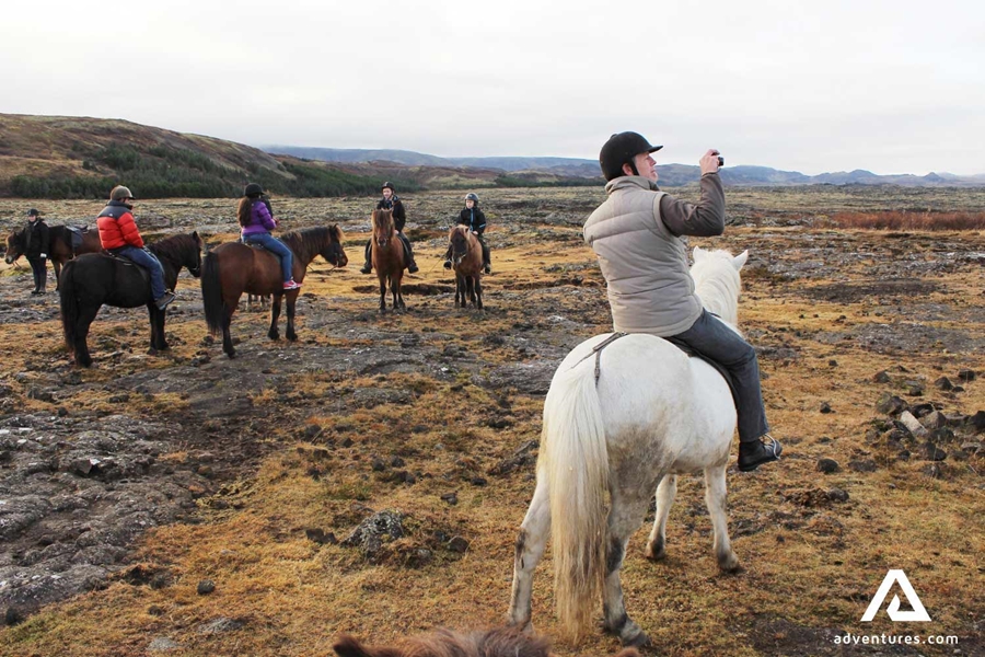 taking pictures on a horse riding tour