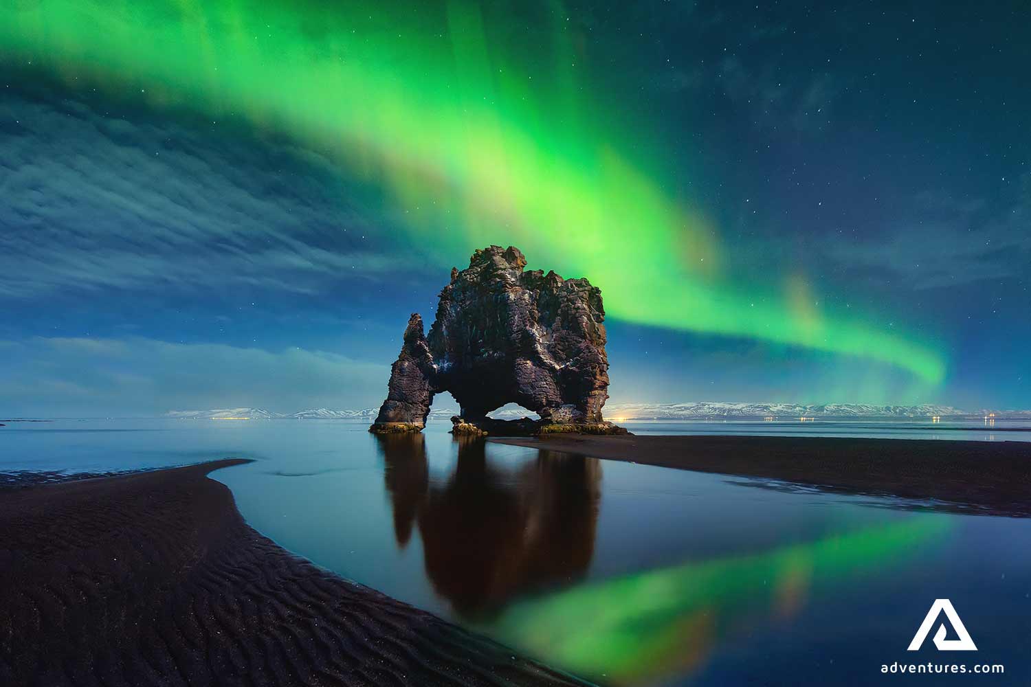 northern lights above hvitserkur rock formation