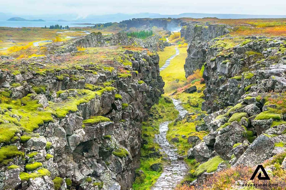 a view of a rugged walking path in thingvellir