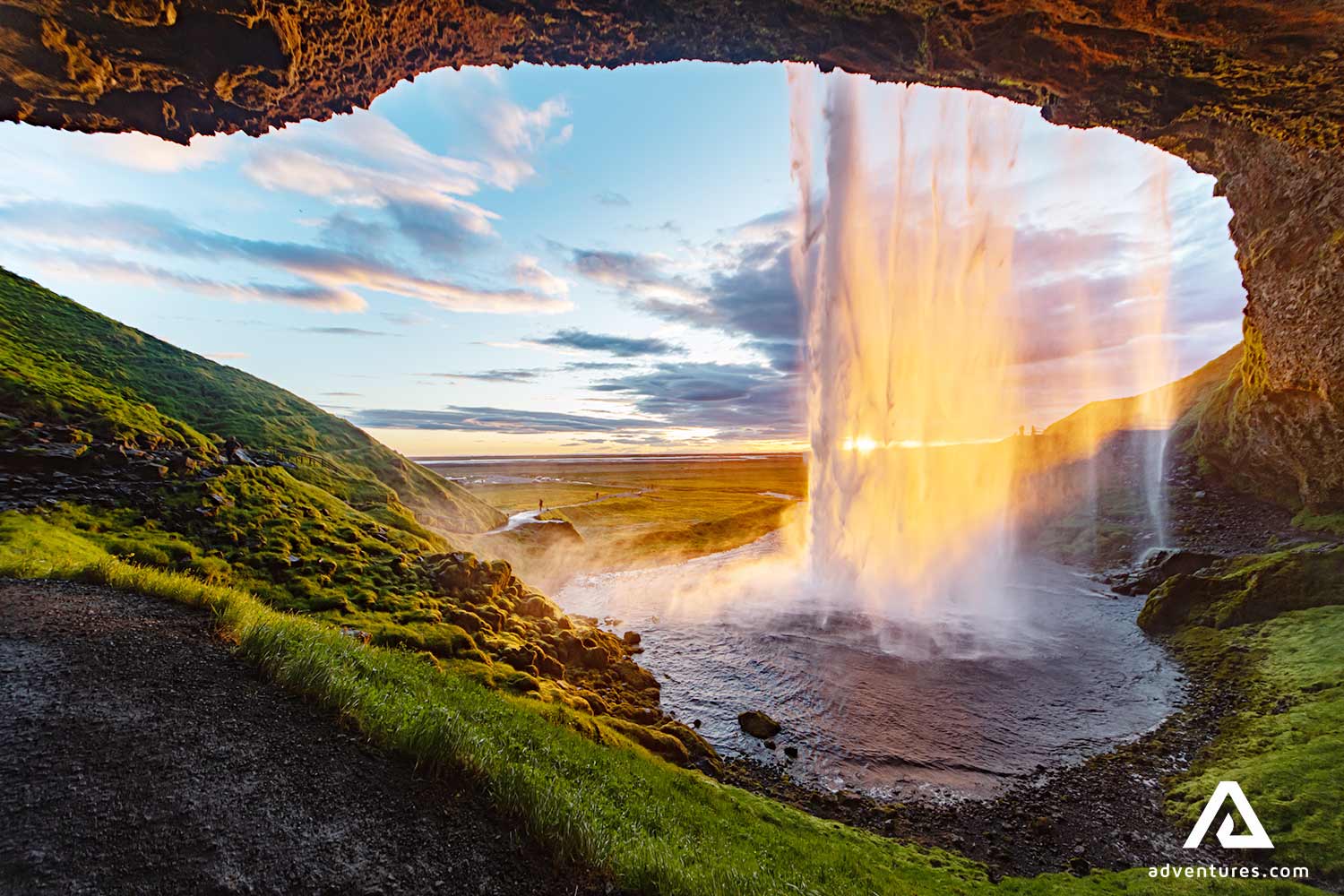 sunset at seljalandsfoss falls in south iceland