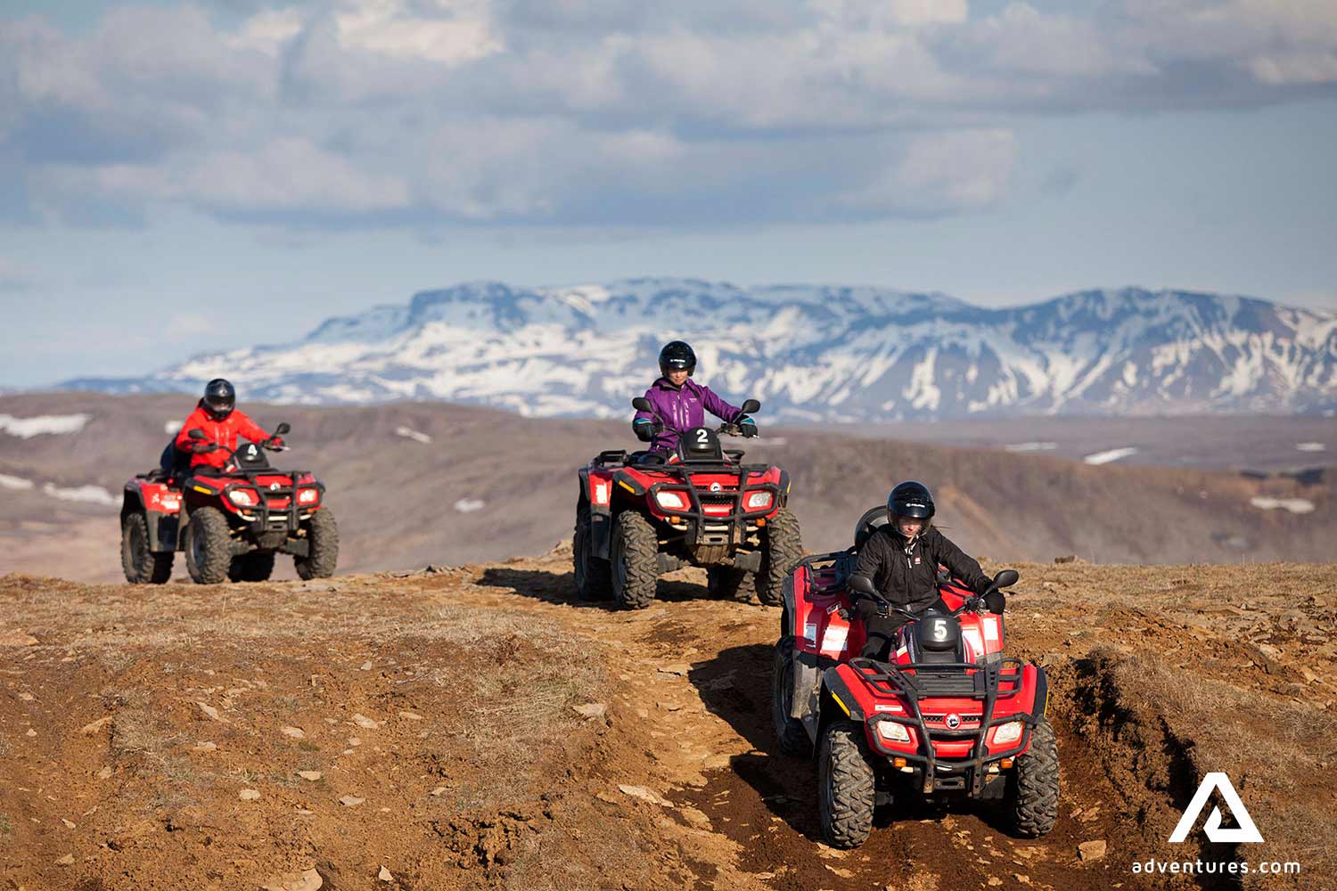riding atvs through mountain roads in iceland