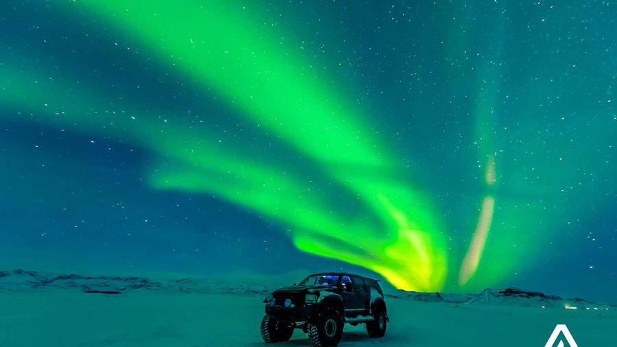 watching northern lights from a super jeep