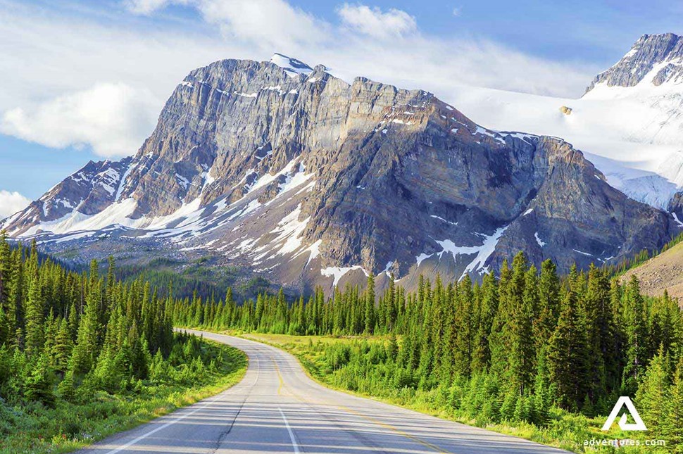 a paved road near canadian rockies and banff