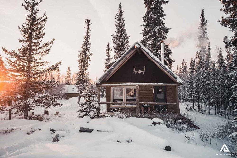 Lonely Lodge in the snowy Canadian forest