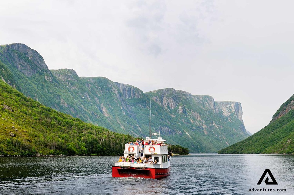 a ferry in western brook pond in gros morne park