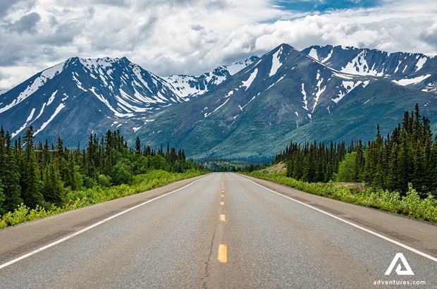 alaska highway near mountains