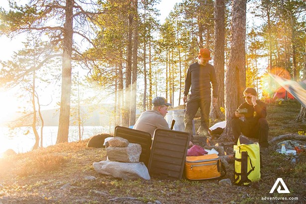 group of friends camping in lapland sweden