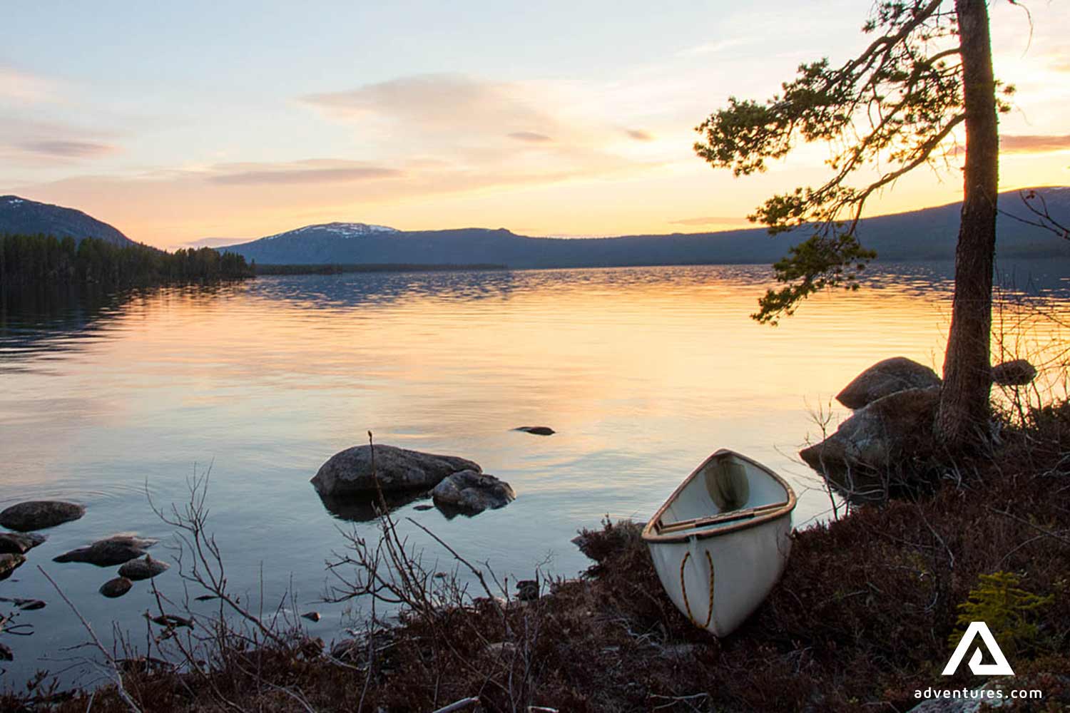 sunset near karats lake and a canoe in jokkmokk area