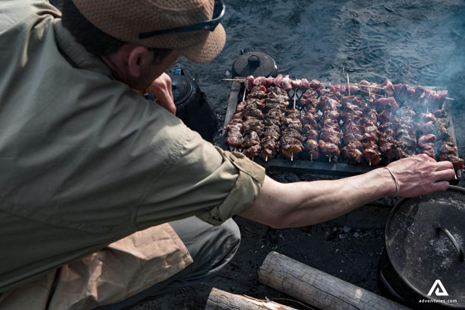 grilling food on campfire