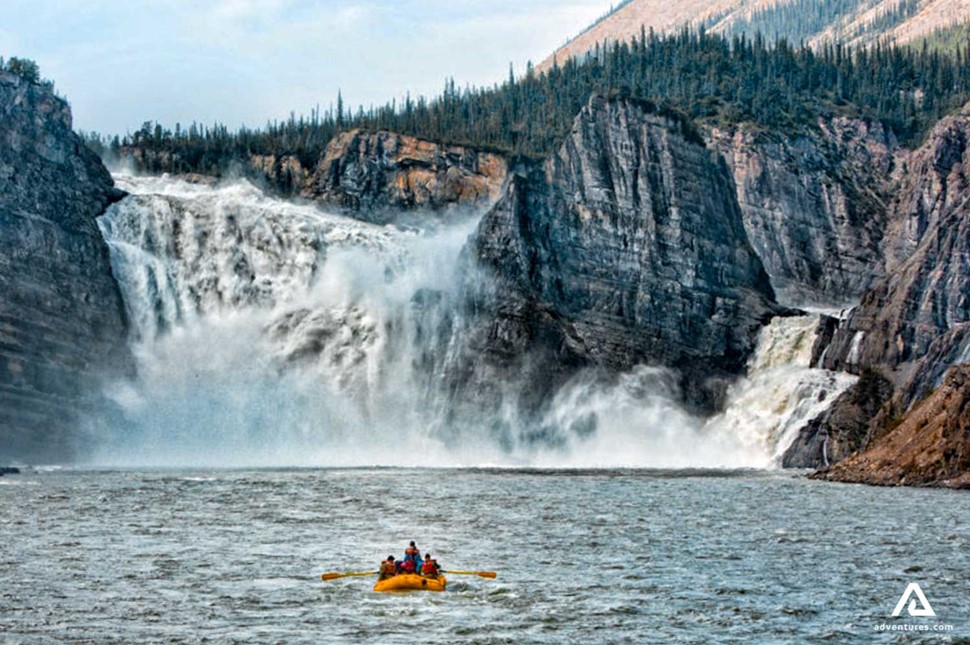 rafting near a powerful waterfall in nahanni river
