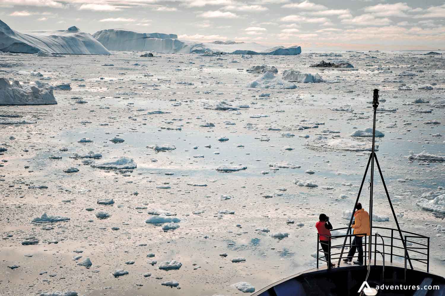 watching icebergs float from a ship deck