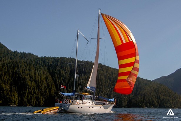 Sailing boat with a colorful sail