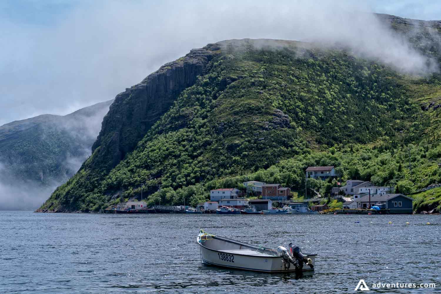 small boat near sea shore in newfoundland
