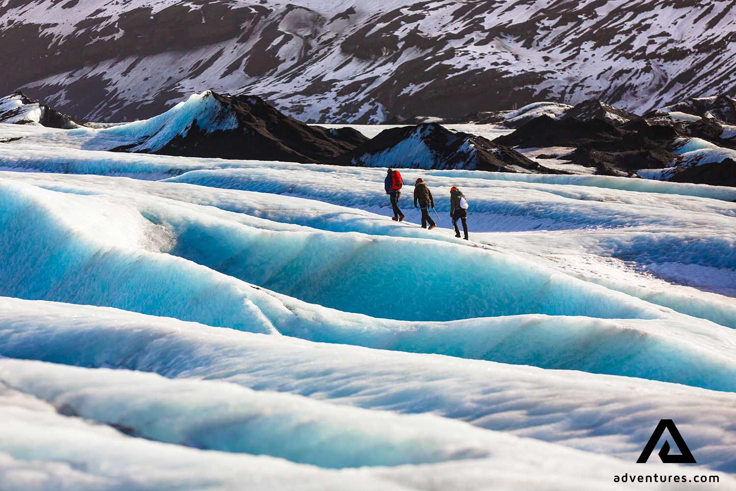 walking with a guide on solheimajokull glacier