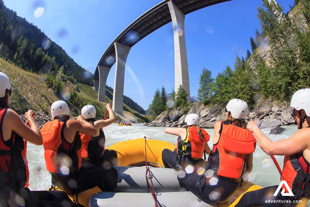 group rafting in a powerful river stream