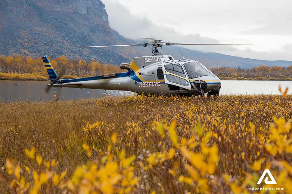 a helicopter in a field in sweden