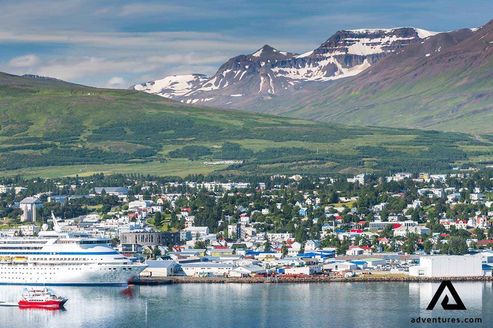 town of akureyri and a cruise ship in summer