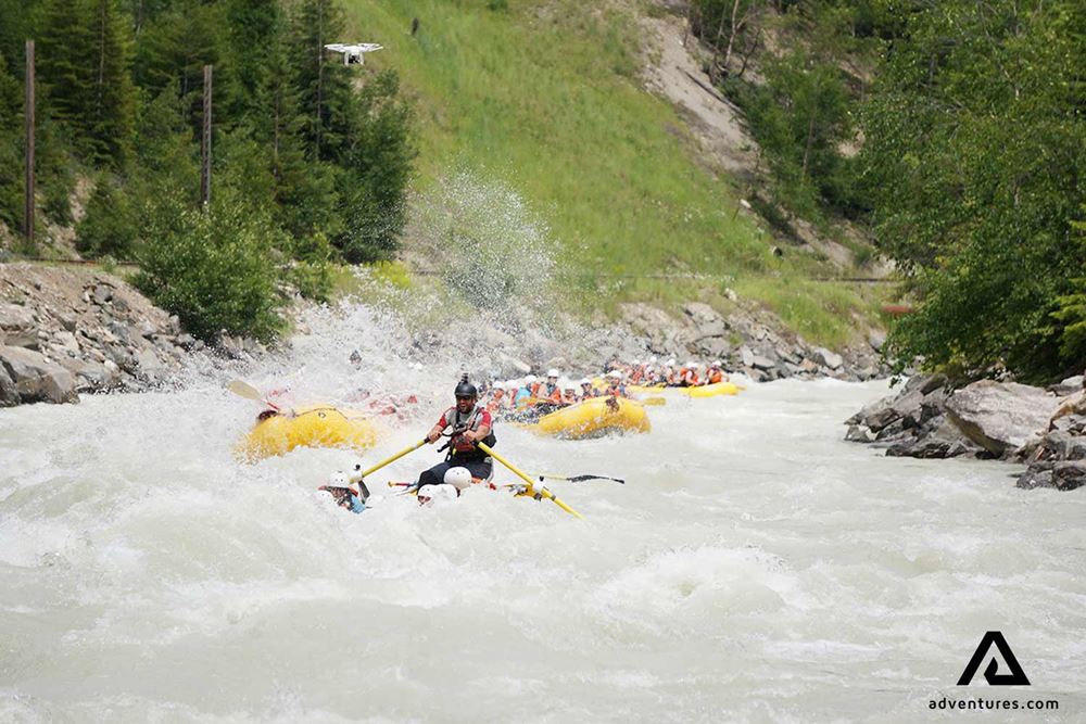 guide leading a rafting group