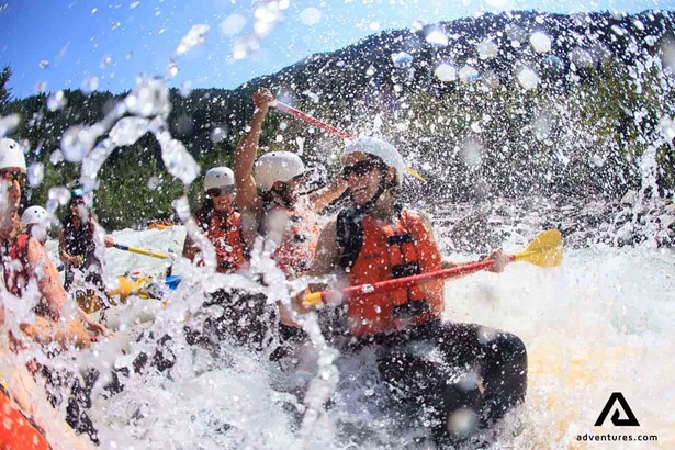 happy rafters in kicking horse river rafting