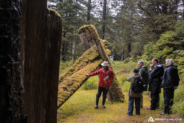 Tourists exploring ancient Haida villages