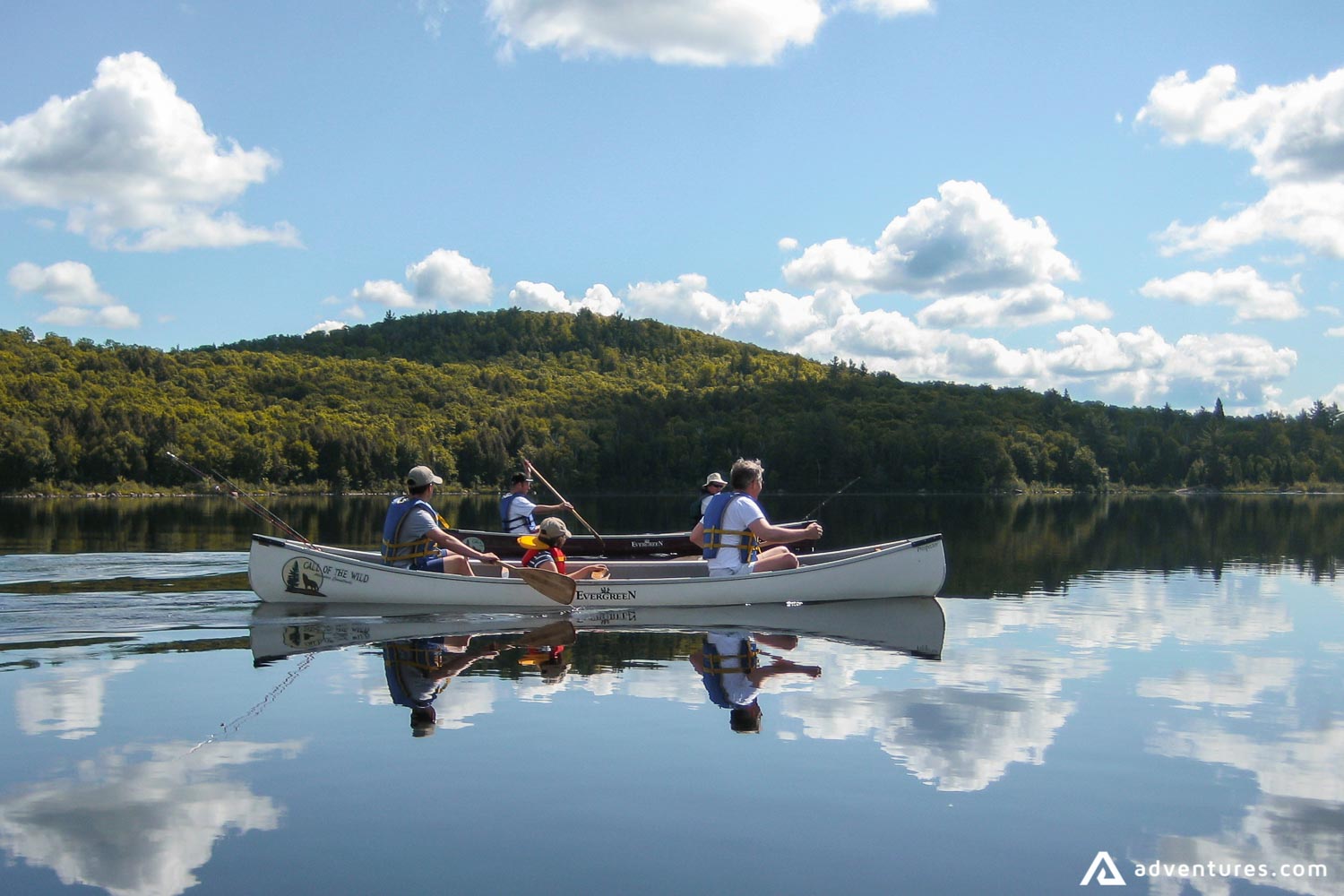 canoeing at a lake on a sunny day in canada